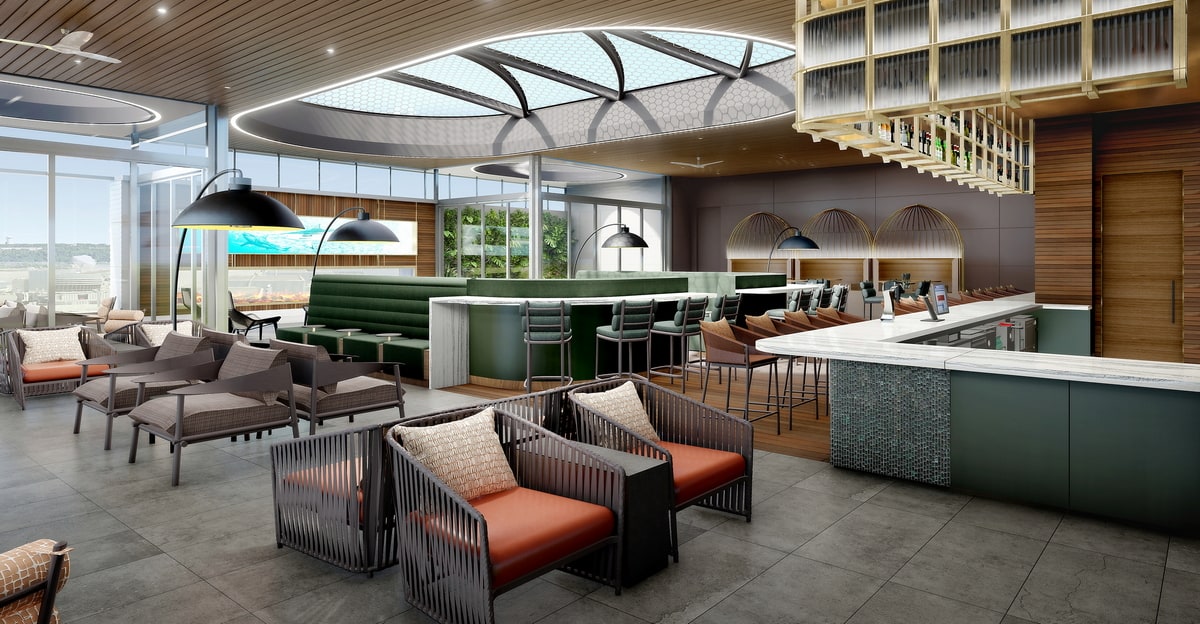 outdoor deck with seating and tables.