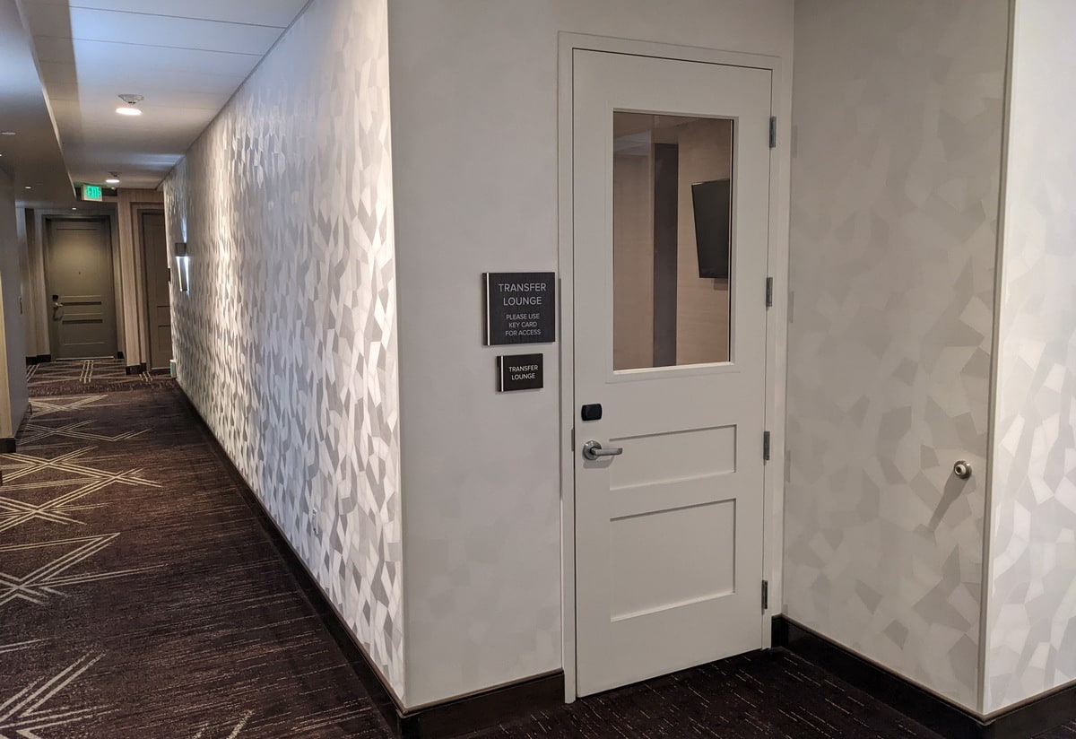 view outside the Transfer Lounge of the door with keypad.
