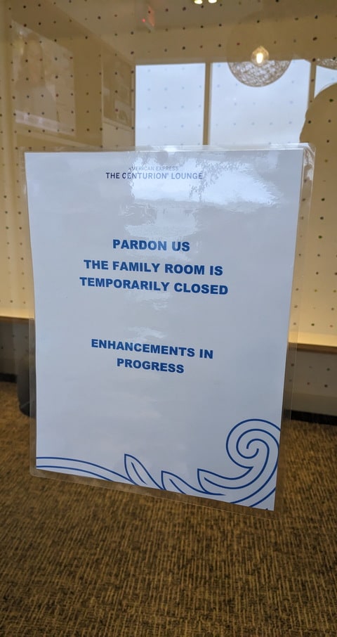 family room, with closed door and place to kids.