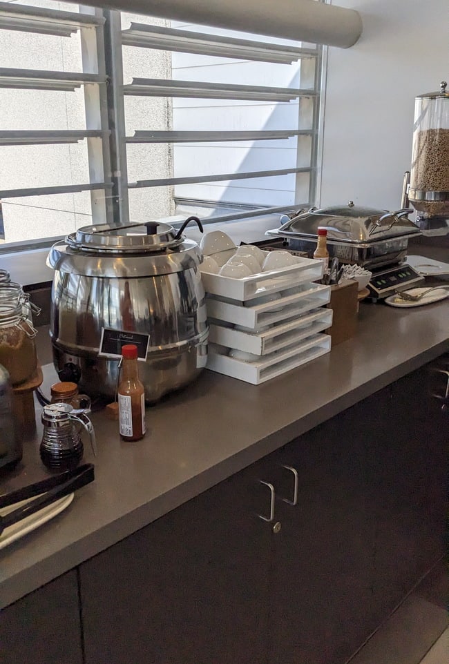 self-serve food area with hot food.