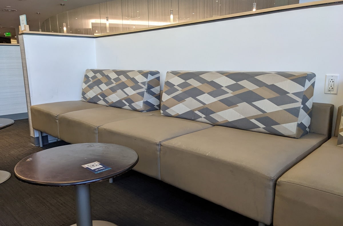 sofa, table and seating in the main lounge area.