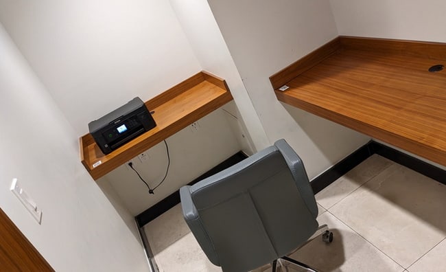 dedicated working room with printer and work tables.