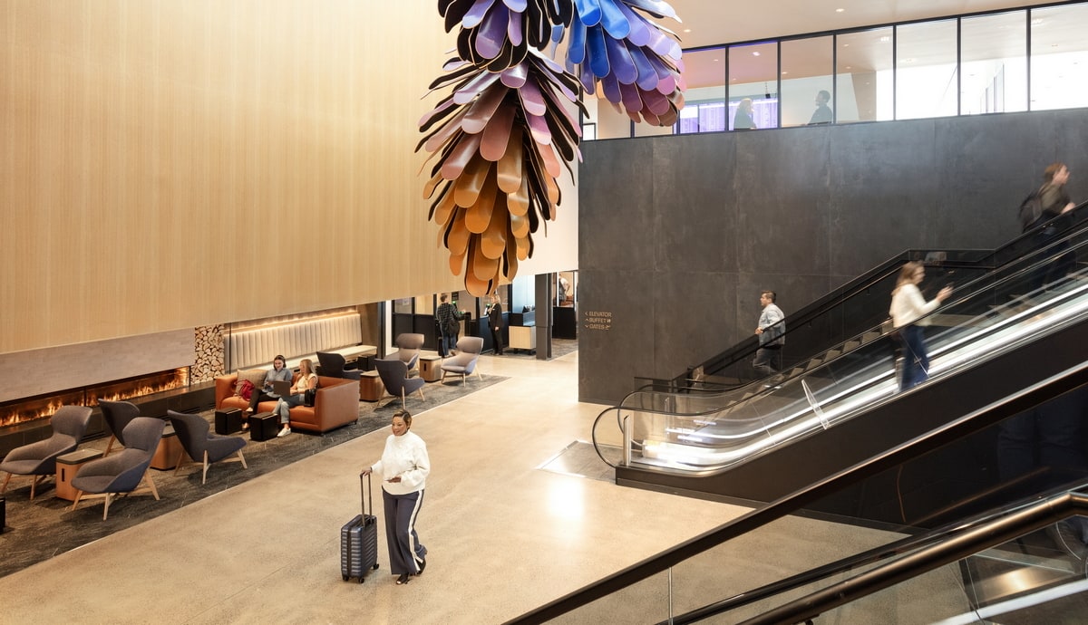 rendering of the United Club in Denver with stairs and seating in an open air.