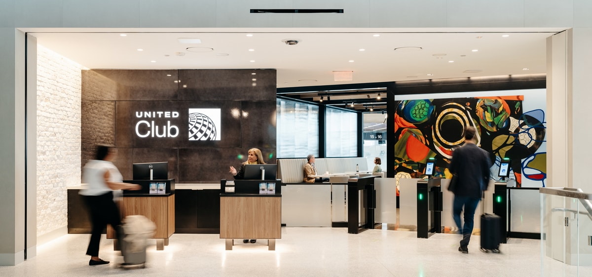Entrance gates and reception at United Lounge at Newark Terminal A.