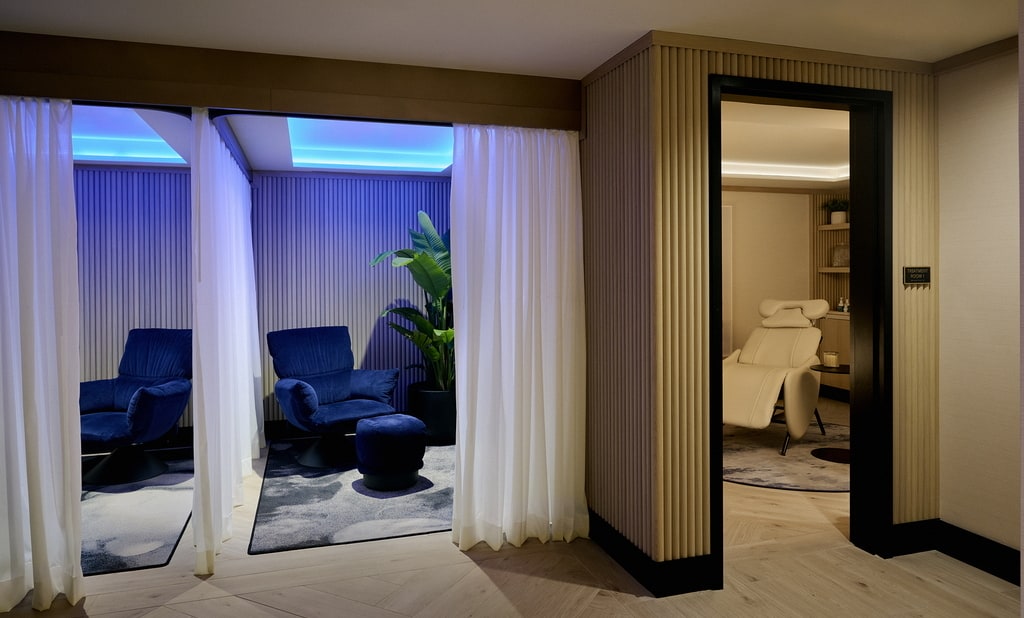 wellness room with quite room, chair, and treatment rooms.