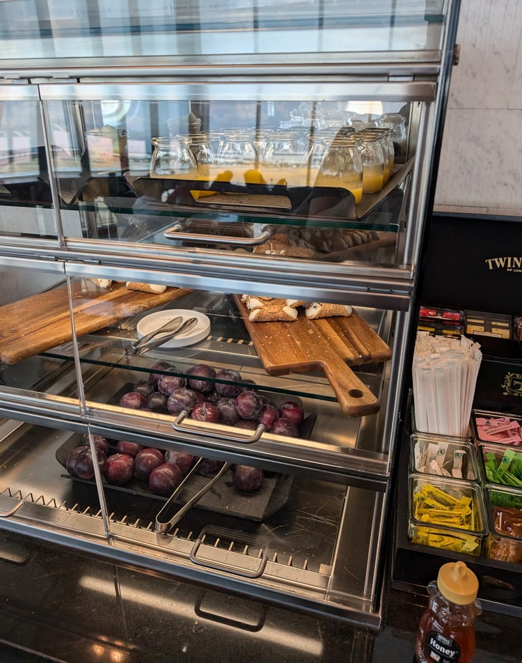 snack area with cannoli and fresh juices.