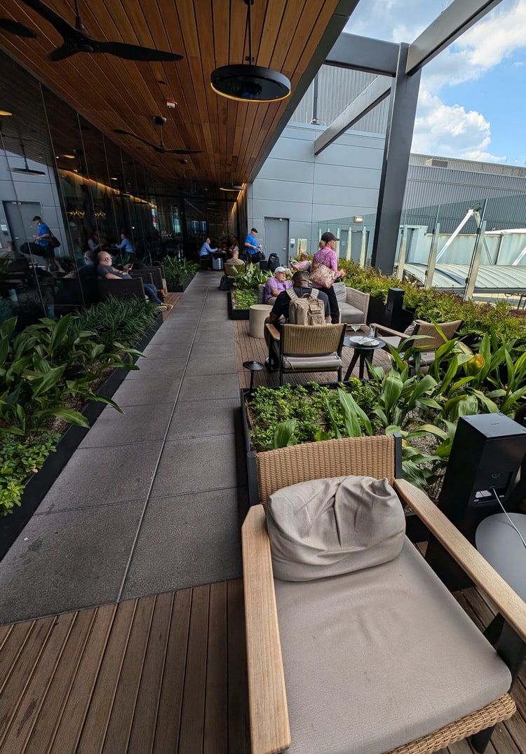 outside terrace with views of airplanes.