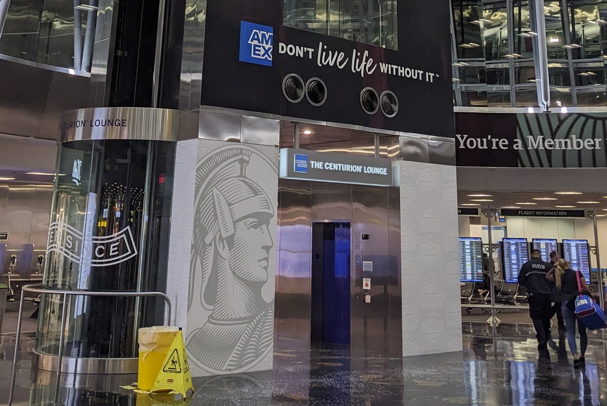 elevator withe a sign of The Centurion Lounge.