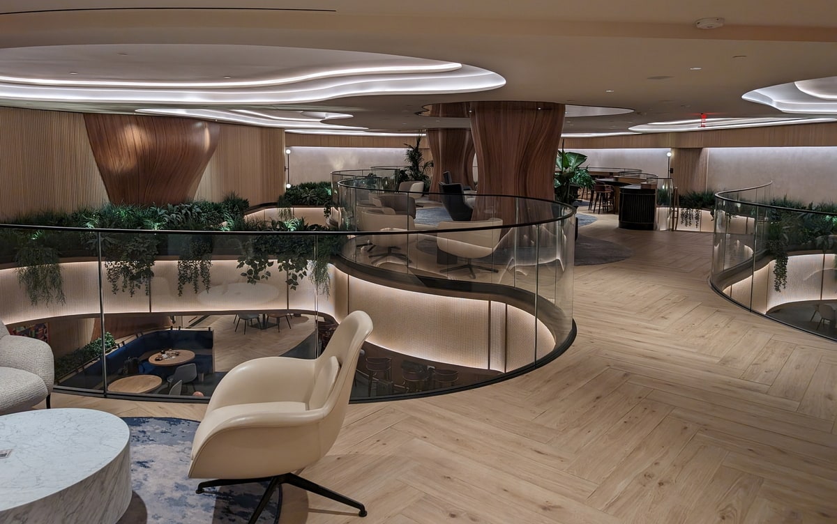 Upstairs at the Chase Sapphire Lounge with seating and tables.