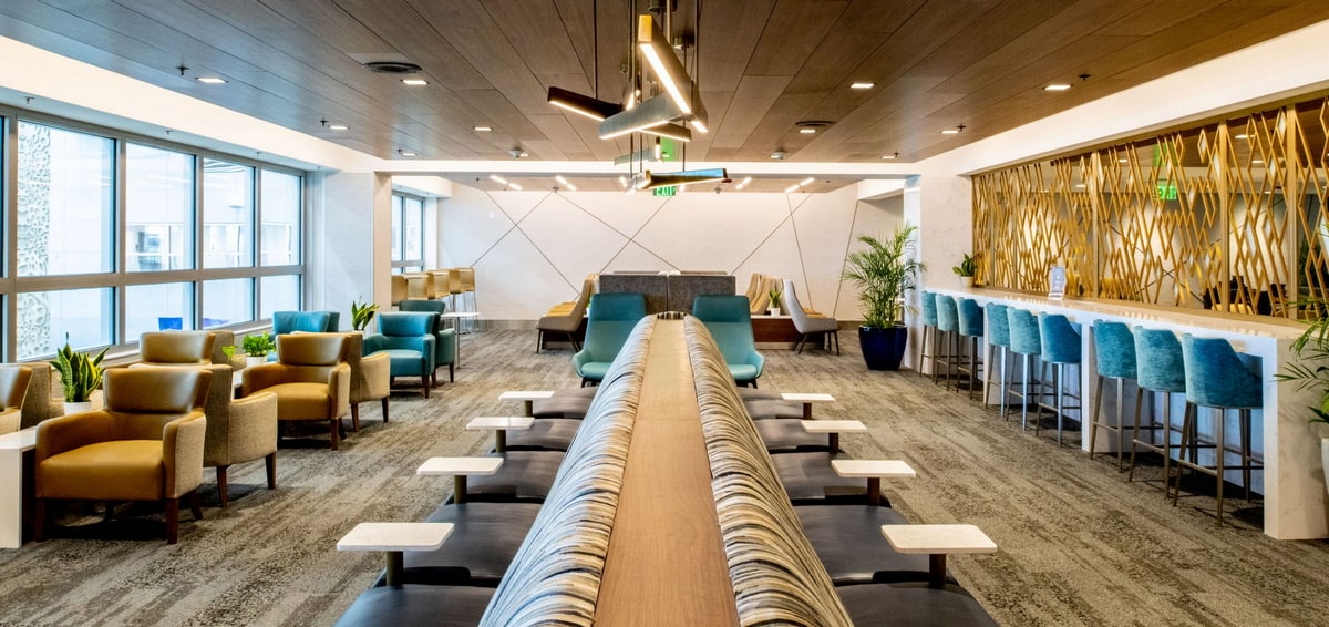 View of seating area and chairs inside lounge.