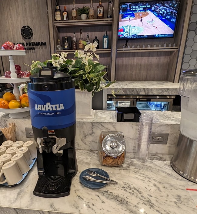 coffee and water station, with cups.