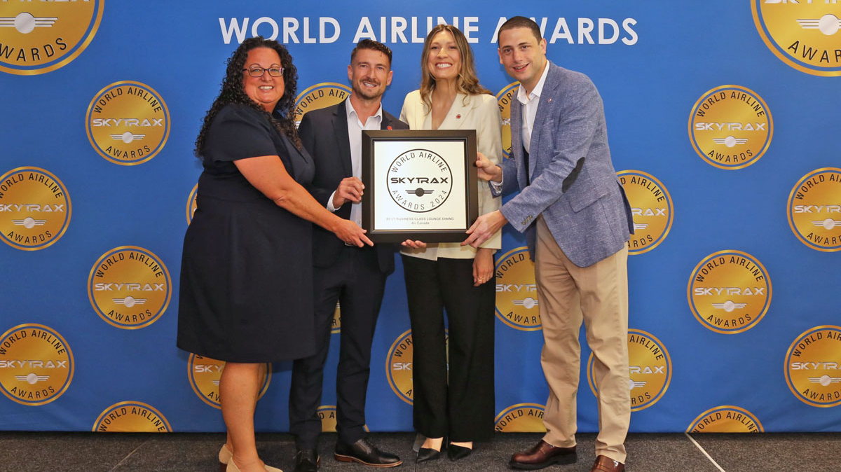 three people holding award for best lounge catering in 2024