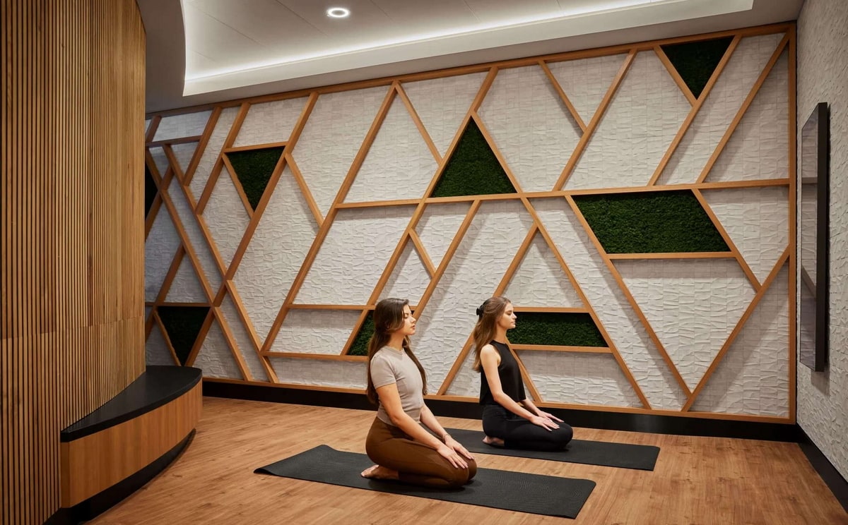 yoga and exercise area, with two people doing yoga.