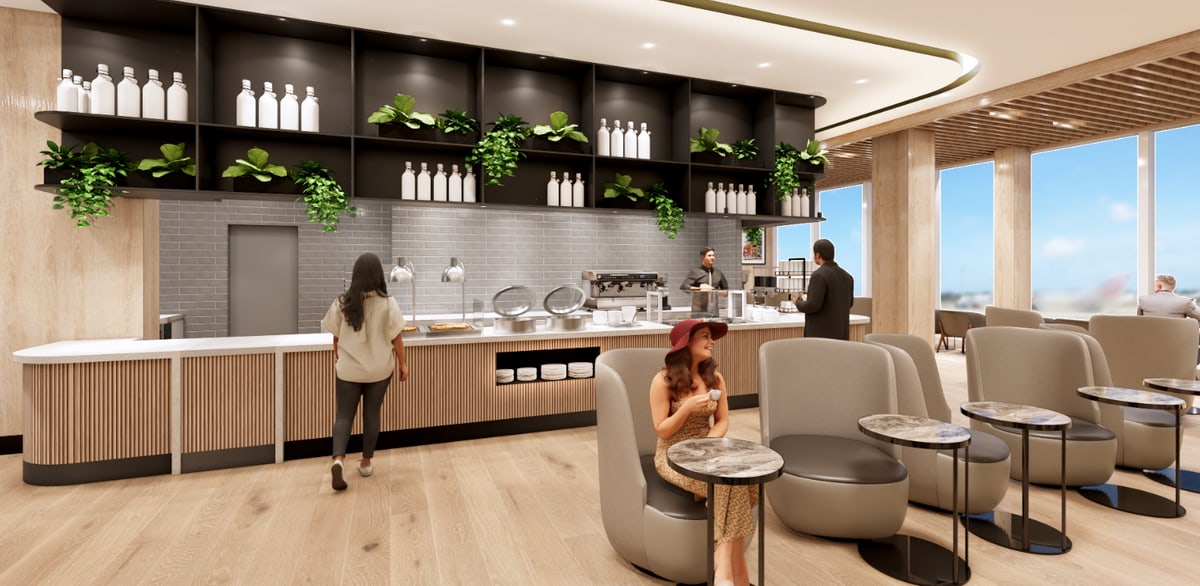 Dining and seating area with tables and windows.