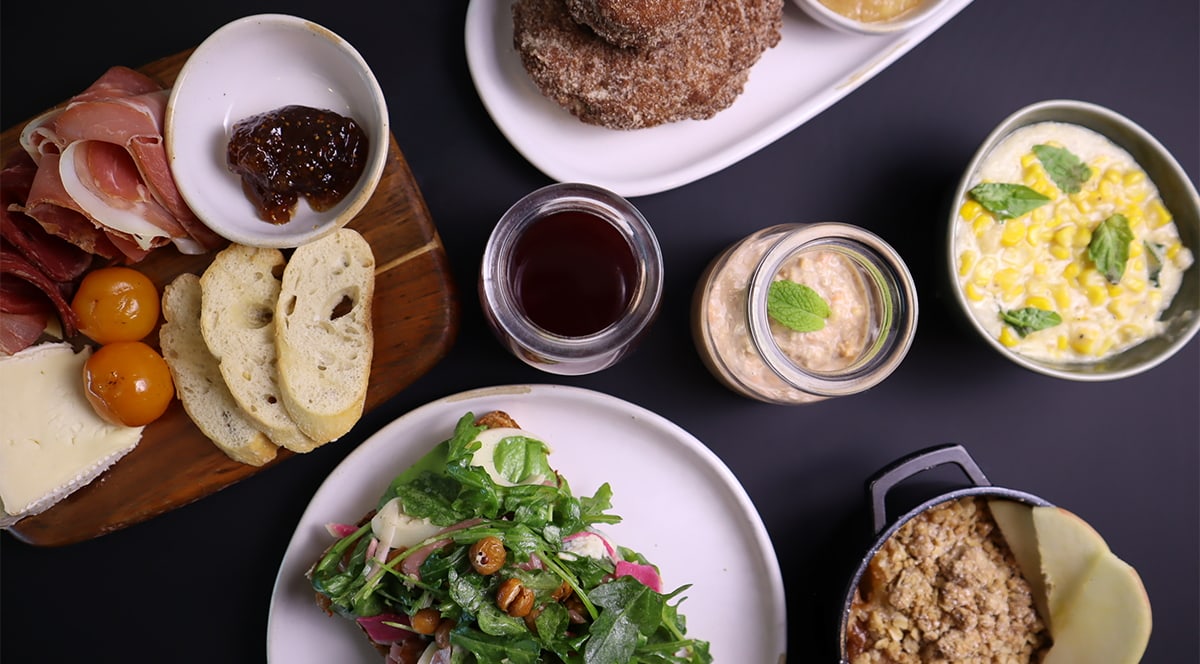 Sample menu items being served in plates and bowls.