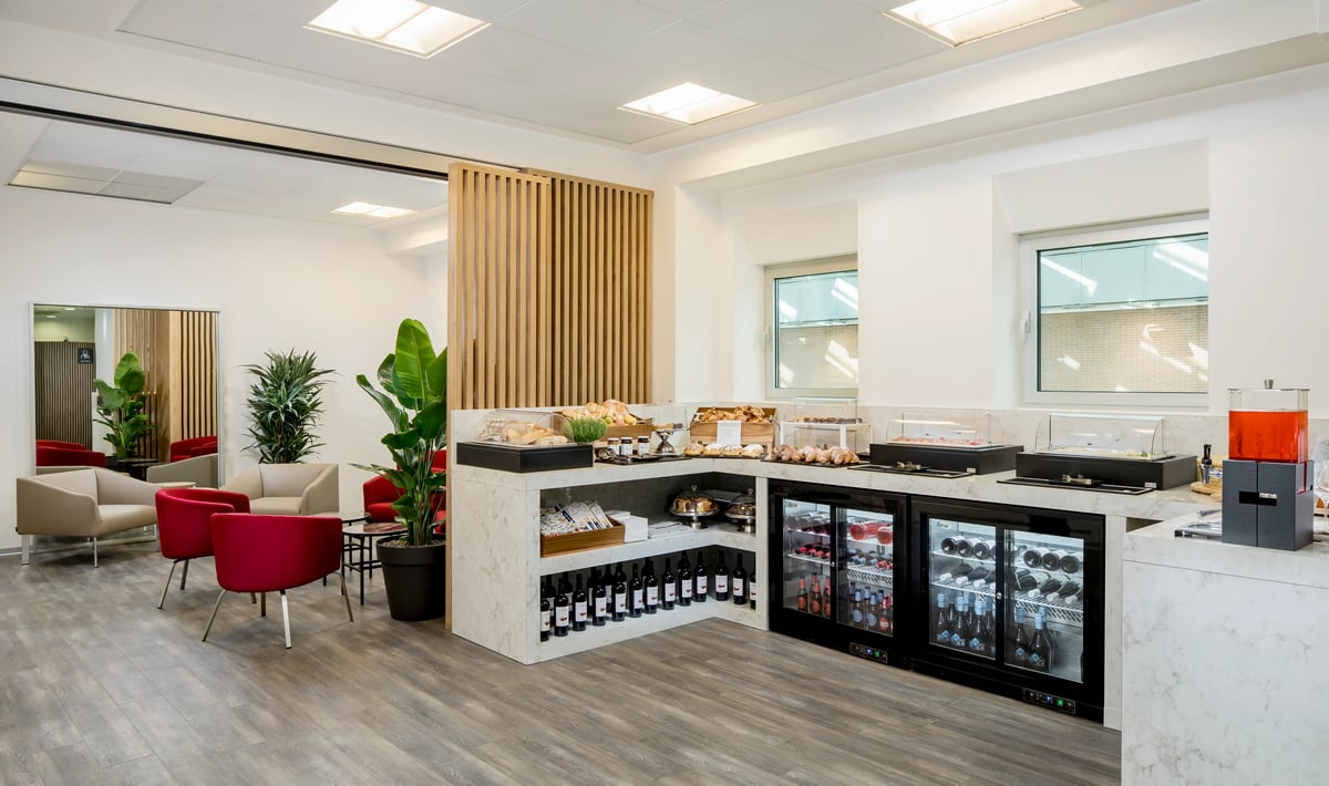 Self-serve dining and beverage area. Self-serve food and drinks in as well as seating.