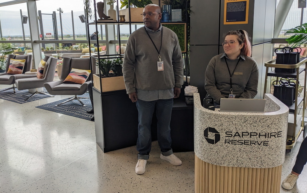 Sapphire Terrance entrance with two people waiting for customers.