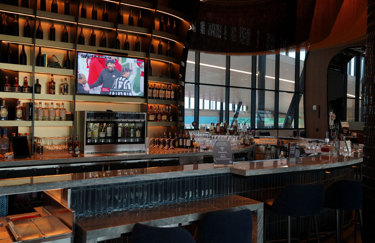 bar with seating and full service drink service.