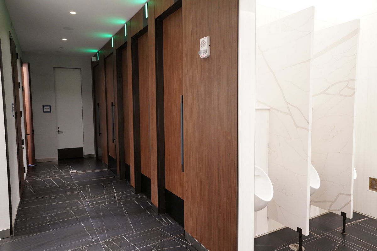private restroom stalls in the mens restroom.