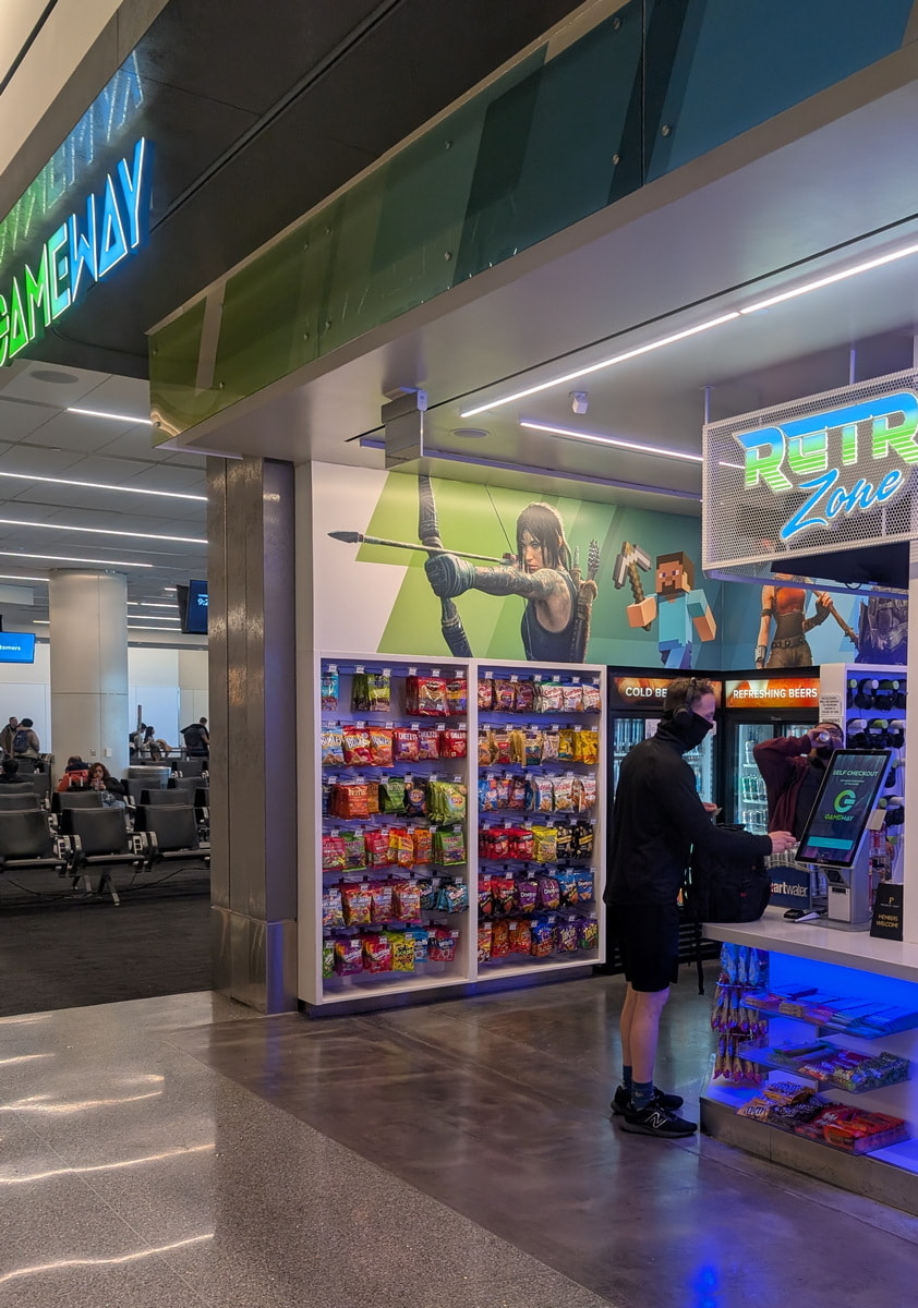 person checking in at the front entrance with snacks and drinks.