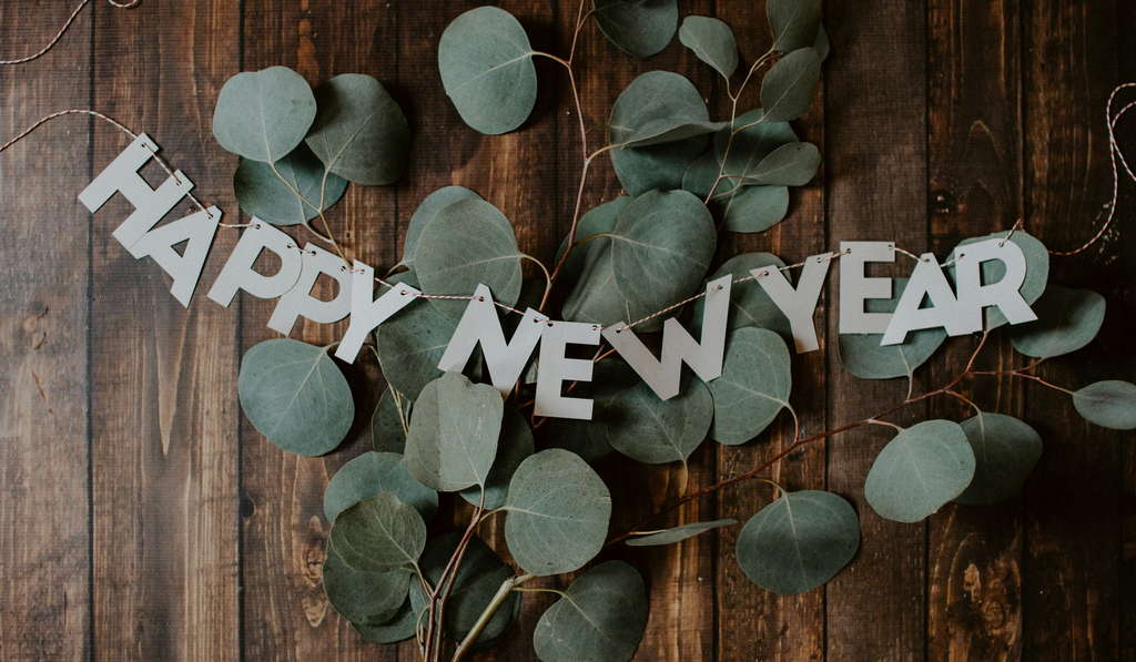 Happy New year’s letters hanging on a wall.