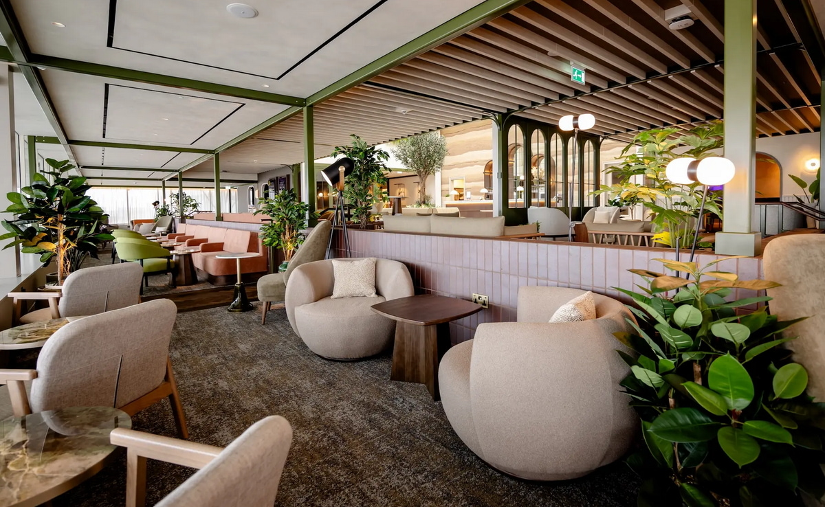 Seating section with chairs and tables.