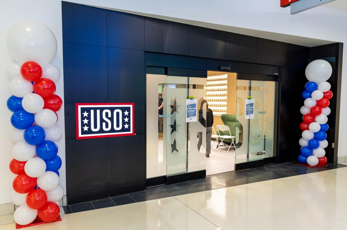Front entrance to USO lounge, with baloons and sliding glass doors.