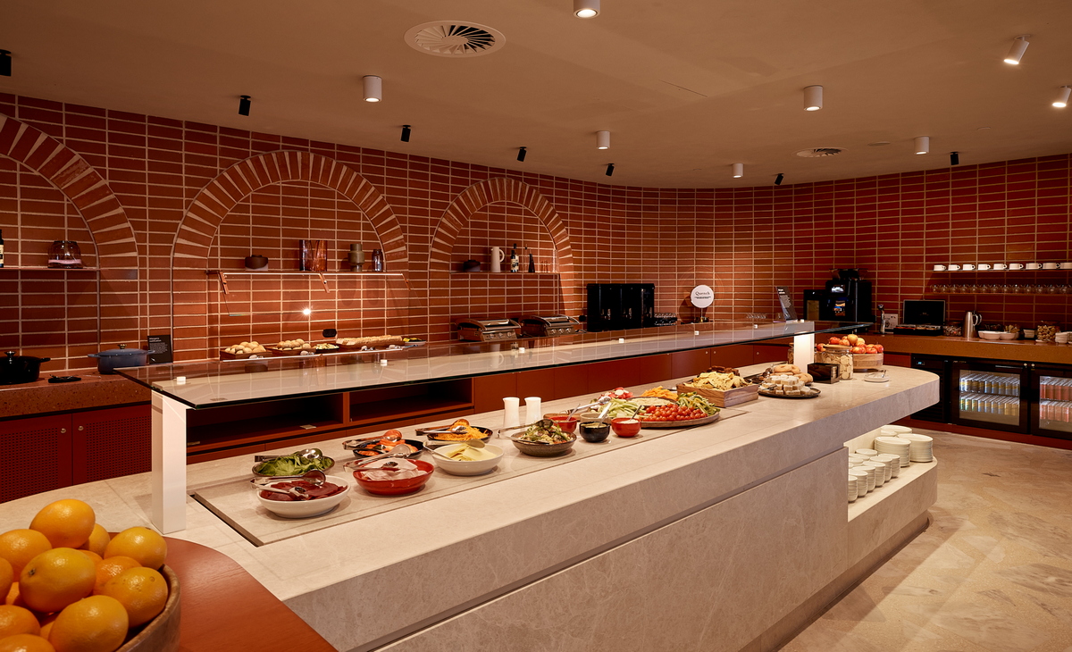 Food buffet with drink stations.