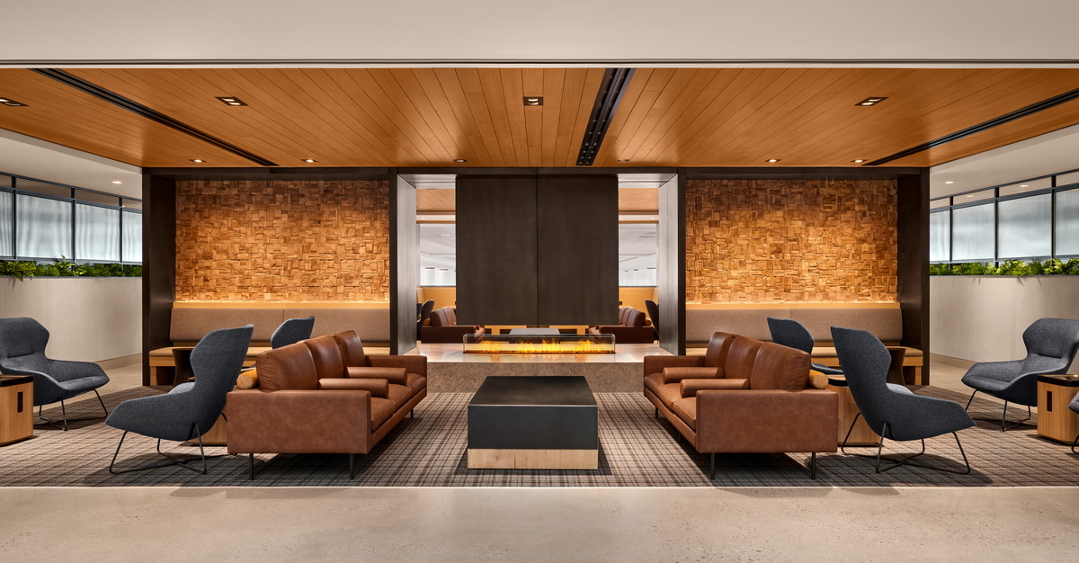 United Club showing seating and fireplace.