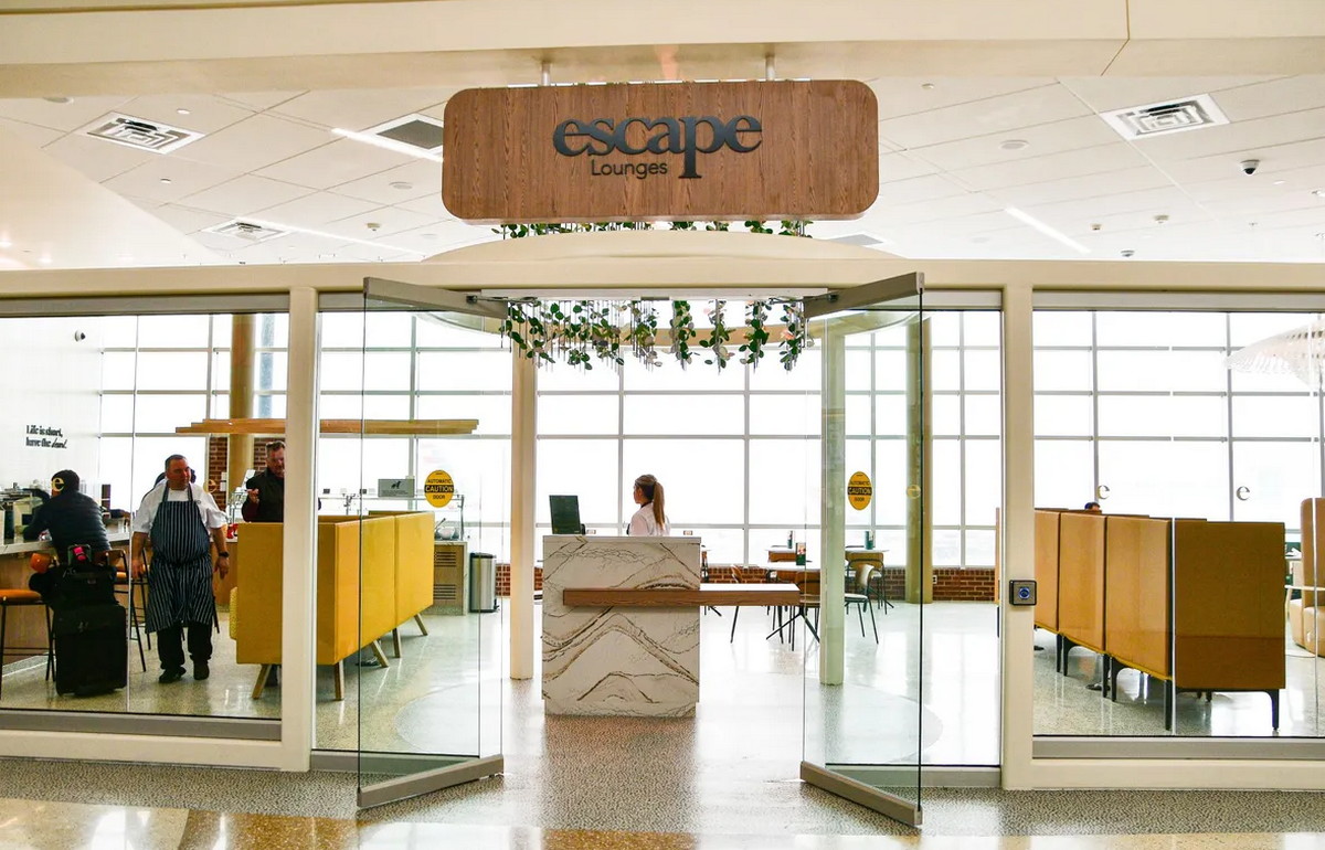 Front entrance area of the Escape Lounge at Northwest Arkansas Airport.
