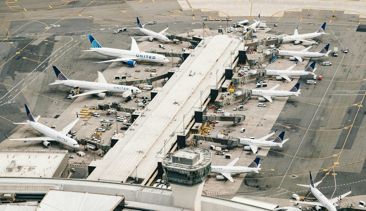 airplanes parked at gate area.