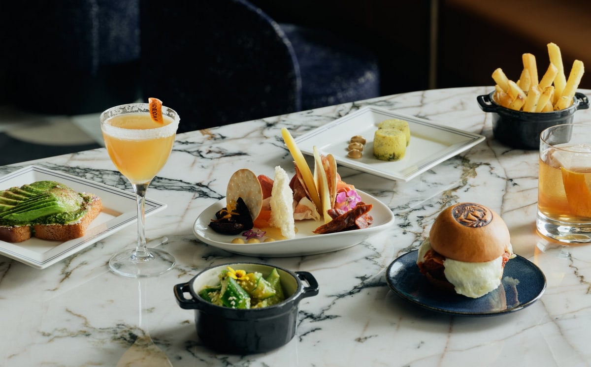 Sample food items on a table showing food from the lounge.