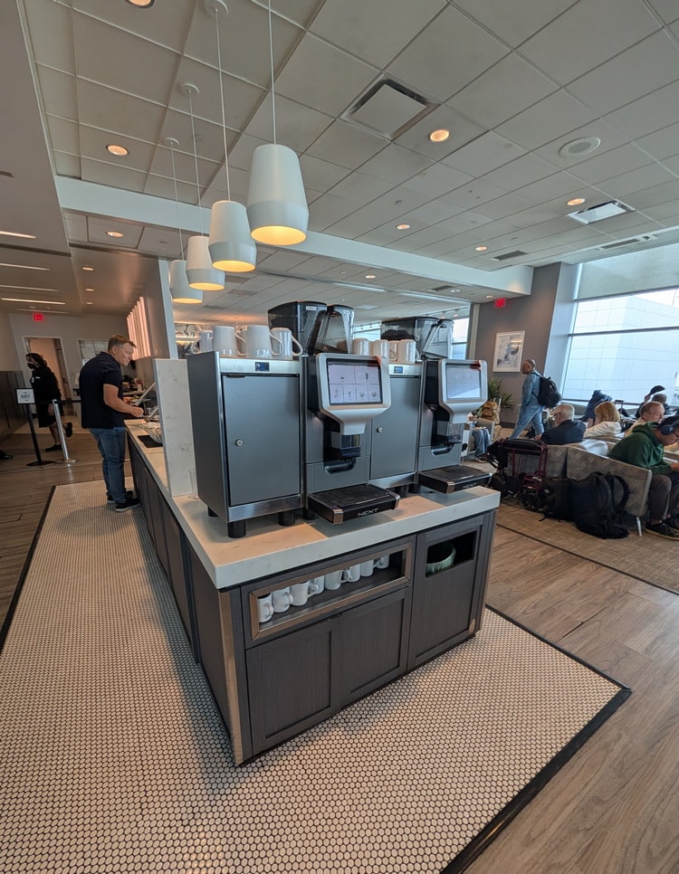 two coffee machines which can serve expresso drinks.