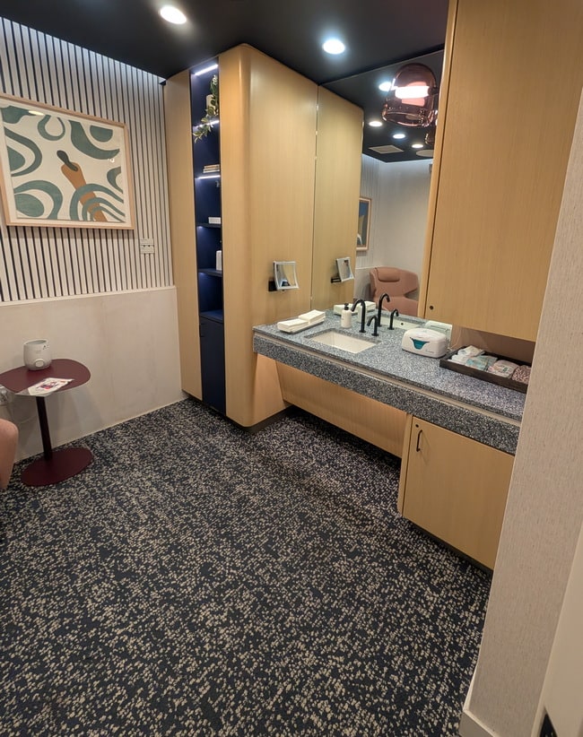 mothers room with a sink and diapers.