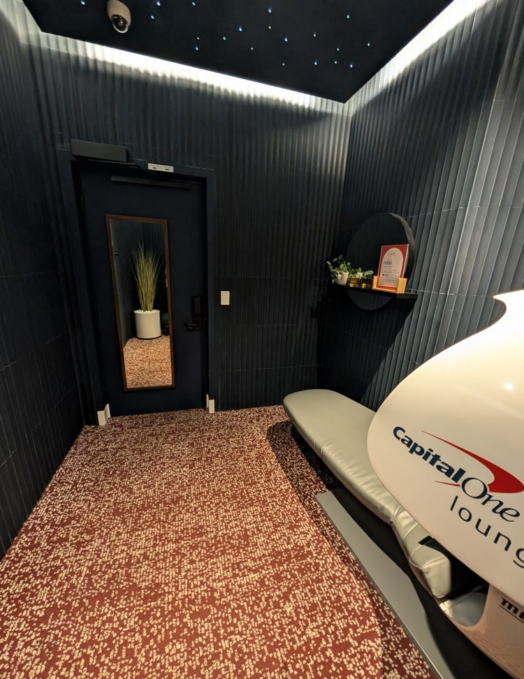 view inside the quiet room with the pod, lighting and floor.