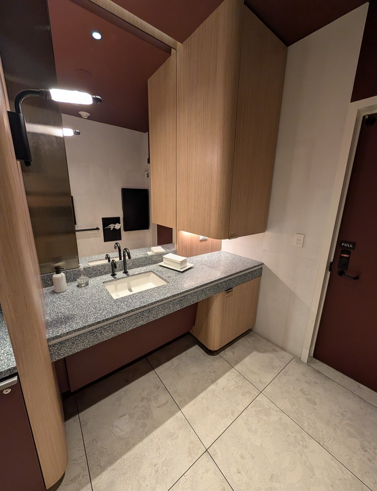 sink area with mirrors.