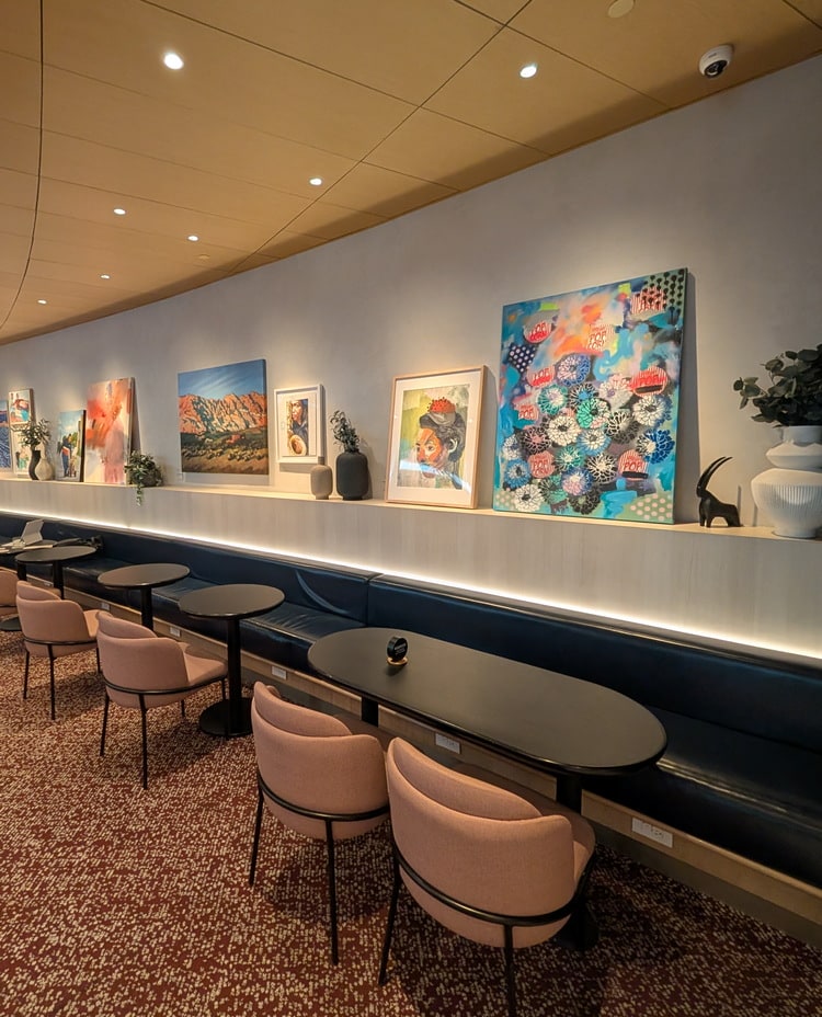 seating, tables and art in the background.