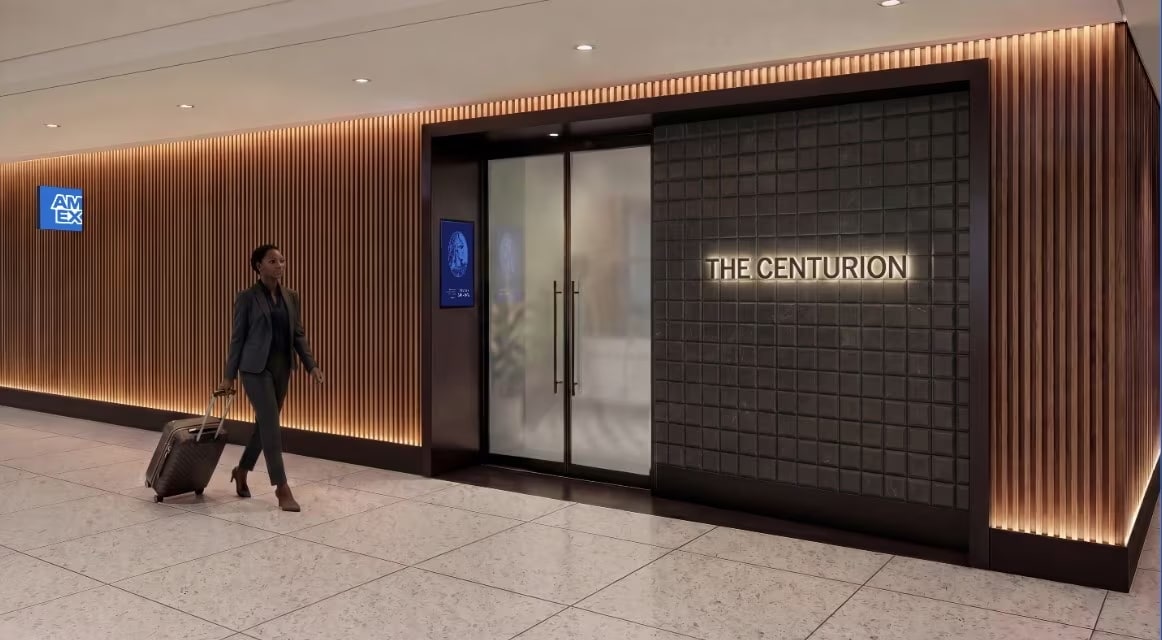 Rendering of a person walking with a roller bag in front of the entrance of The Centurion Lounge.