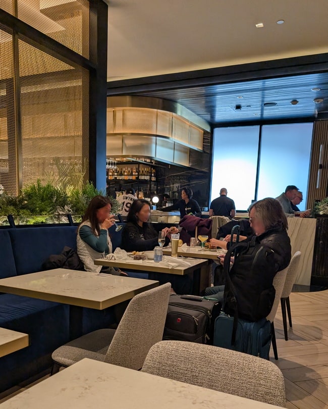 dining area with table and buffet.
