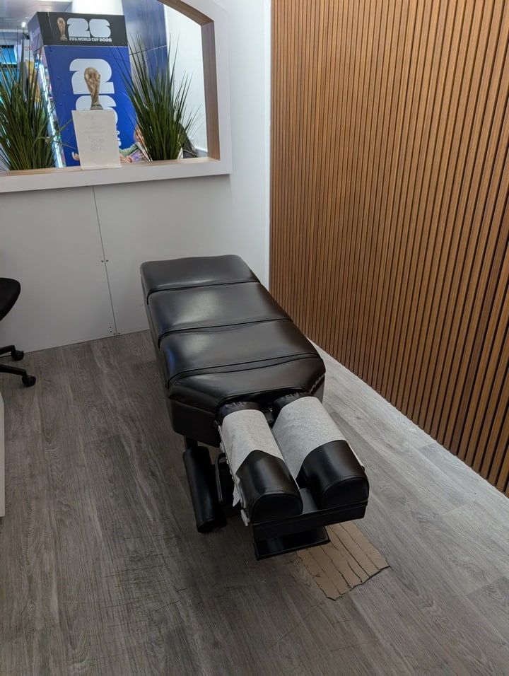 the chair that is used for massage and treatments.