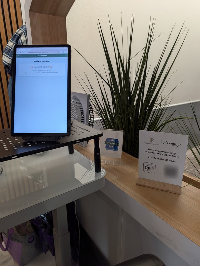 the sign-up desk and station for customers to use.