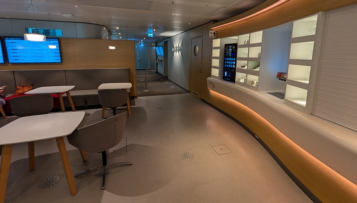 bistro area with beverage station and drink machine.