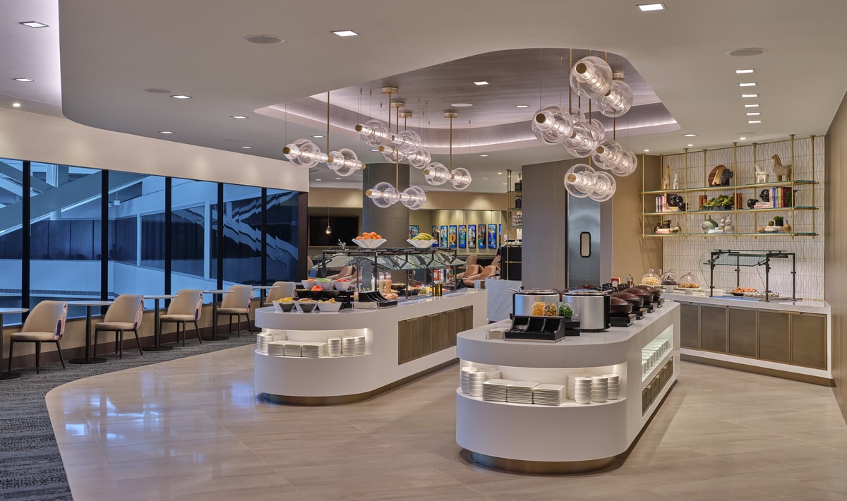 Buffet and dining area with tables and seating.