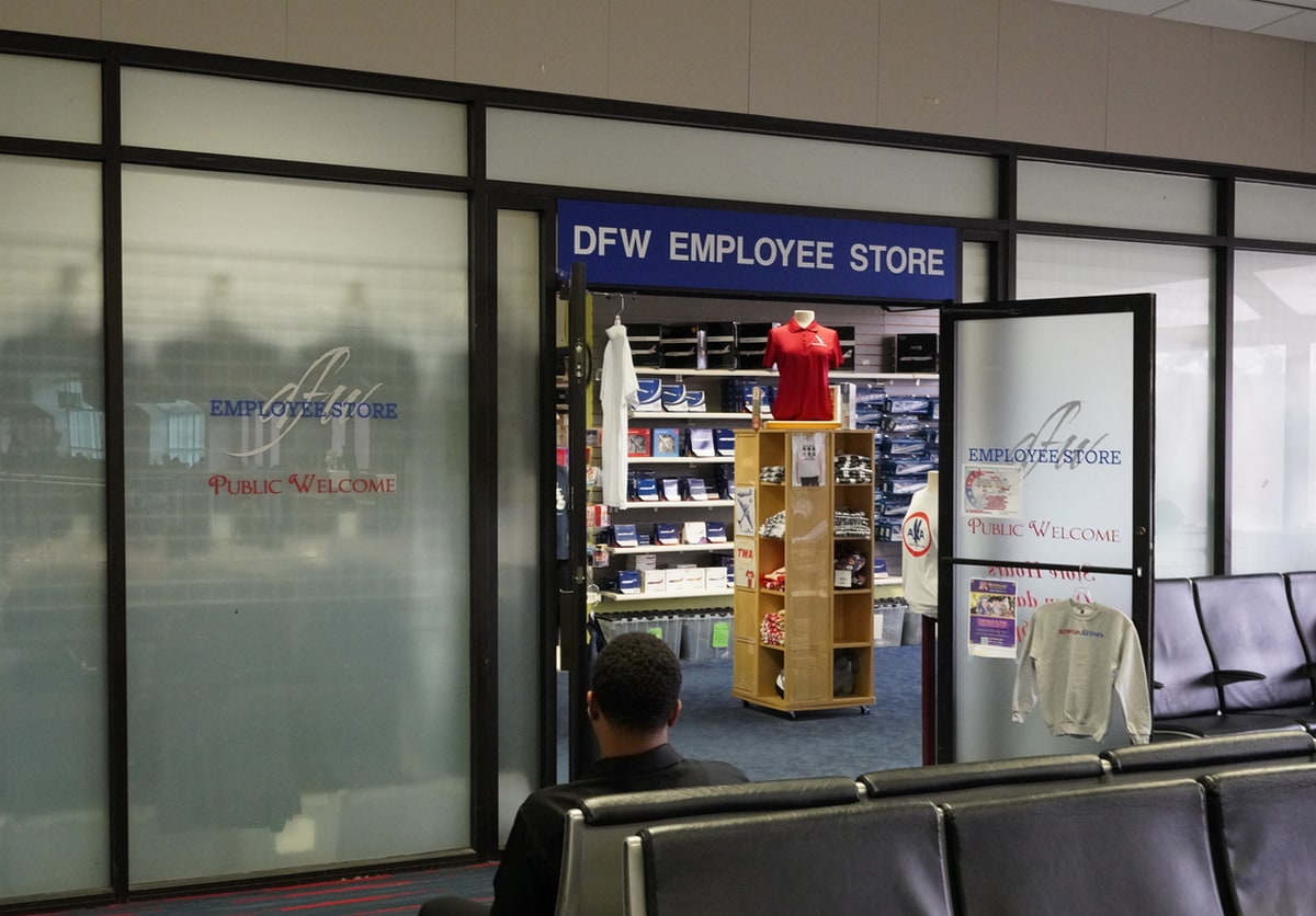 Entrnace to the DFW Employee Store with door and view inside store.