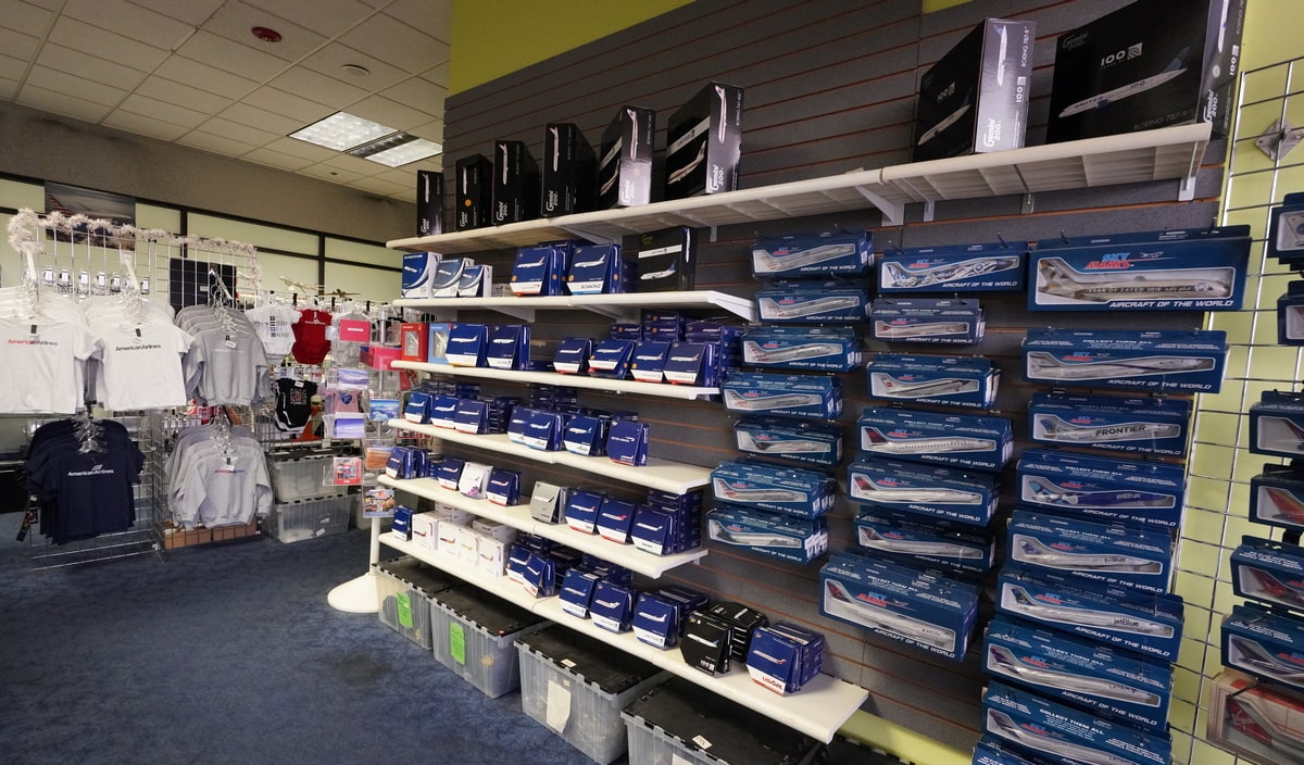 aircraft models of various types, hanging on a wall.