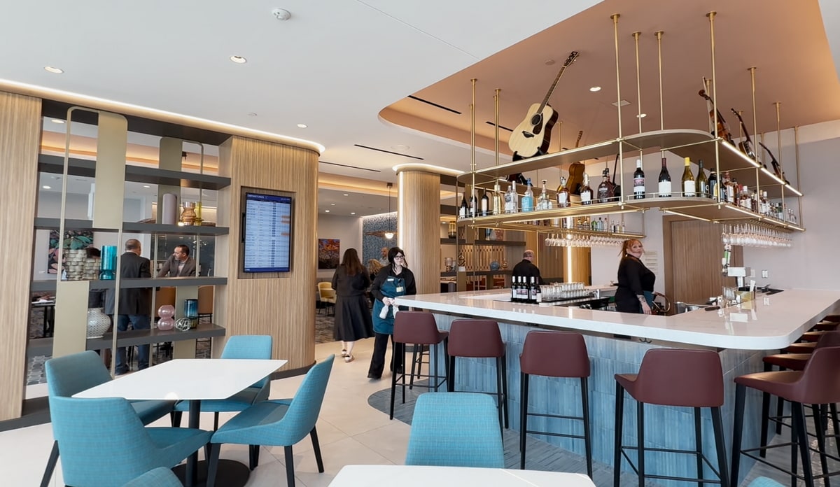 u-shaped bar area with seating, and power plugs at the bar area.