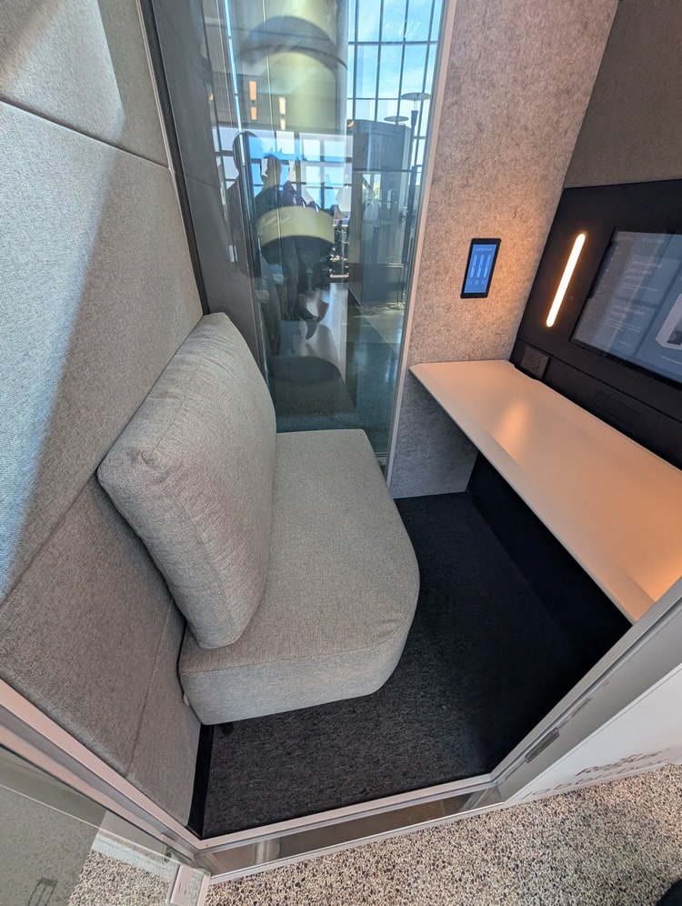 inside the Jabbrrbox pod showing the bench and desk area.