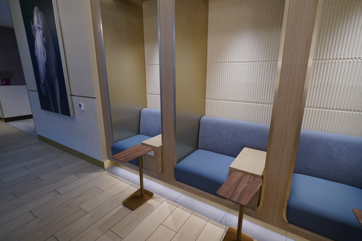 semi-private booths with tables and seating.