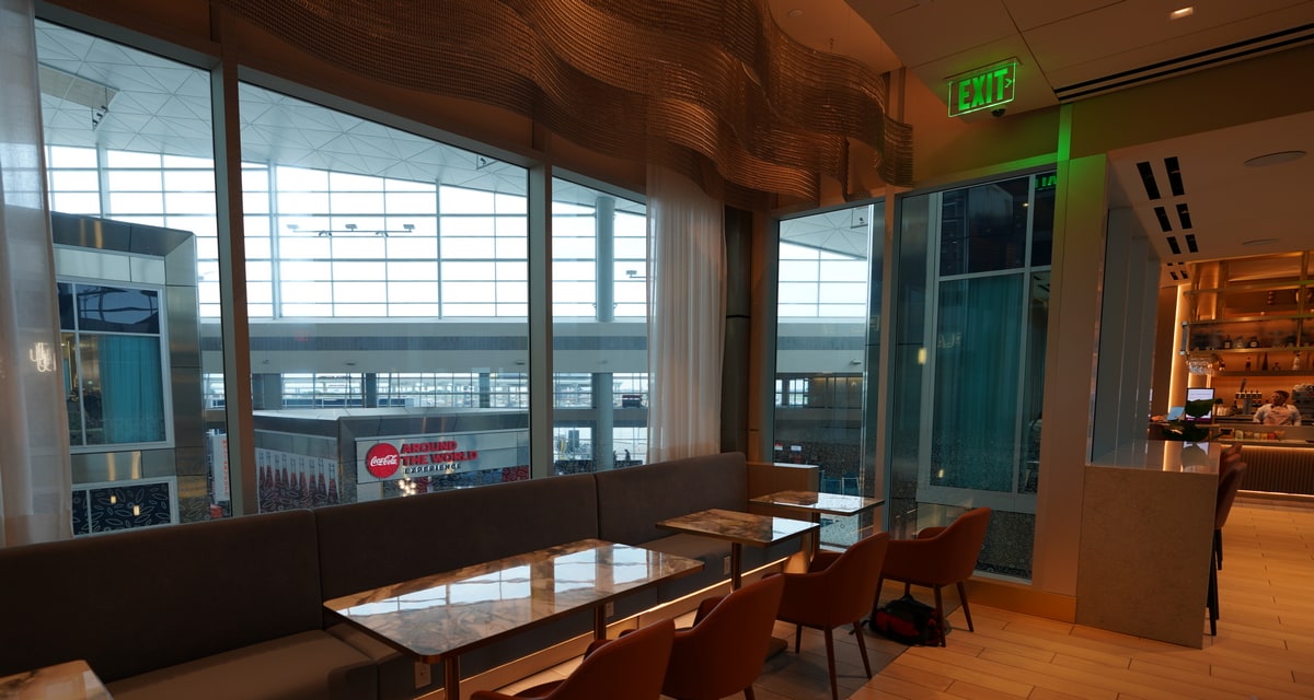 tables and seating area for dining with back in the background.