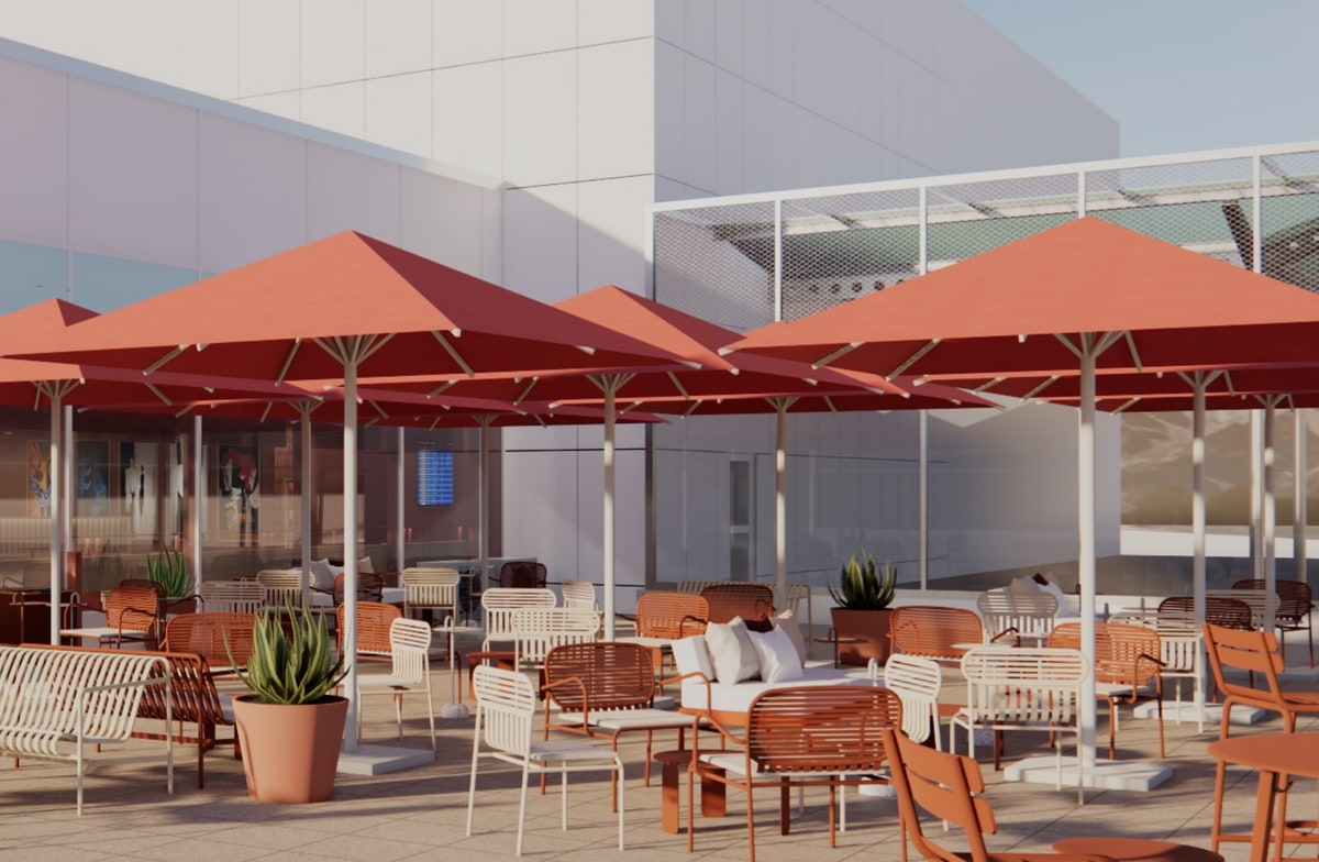 outdoor terrace with seating and covered umbrellas
